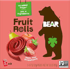 A box of Bear Real Fruit Yoyos in Strawberry flavor. The packaging features a cartoon bear illustration and text highlighting '100% Fruit' and 'No Added Sugar'.