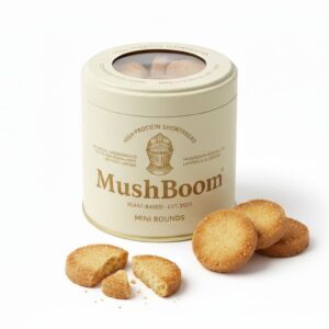 MushBoom high-protein shortbread tin collection, featuring the white Classic Tin